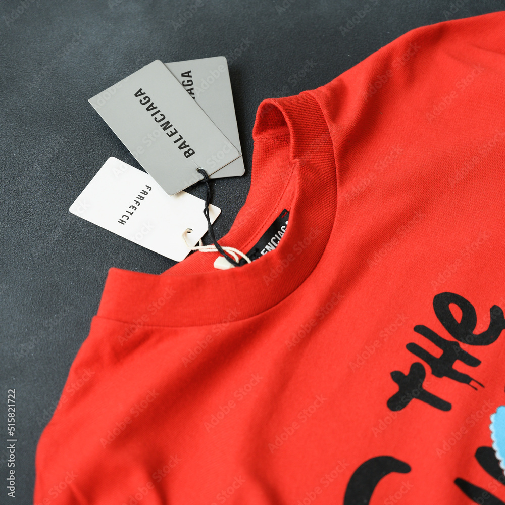 Nikopol, Ukraine, July 1,2022: Top View Male Red Balenciaga T-shirts. New  T-shirt with Tags. Clothing Details Closeup. Online clothing store. Stock  Photo | Adobe Stock