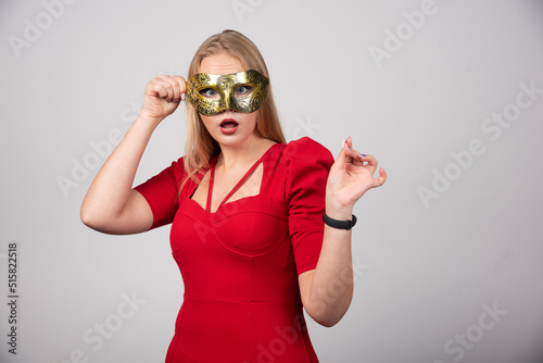 Mysterious Lady with beautiful eyes wearing a mask