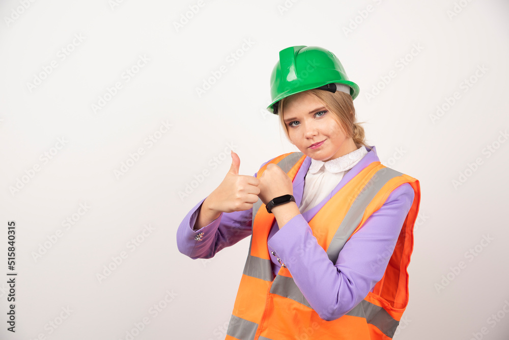 Female industrial employee standing on white background Female industrial employee standing on white background