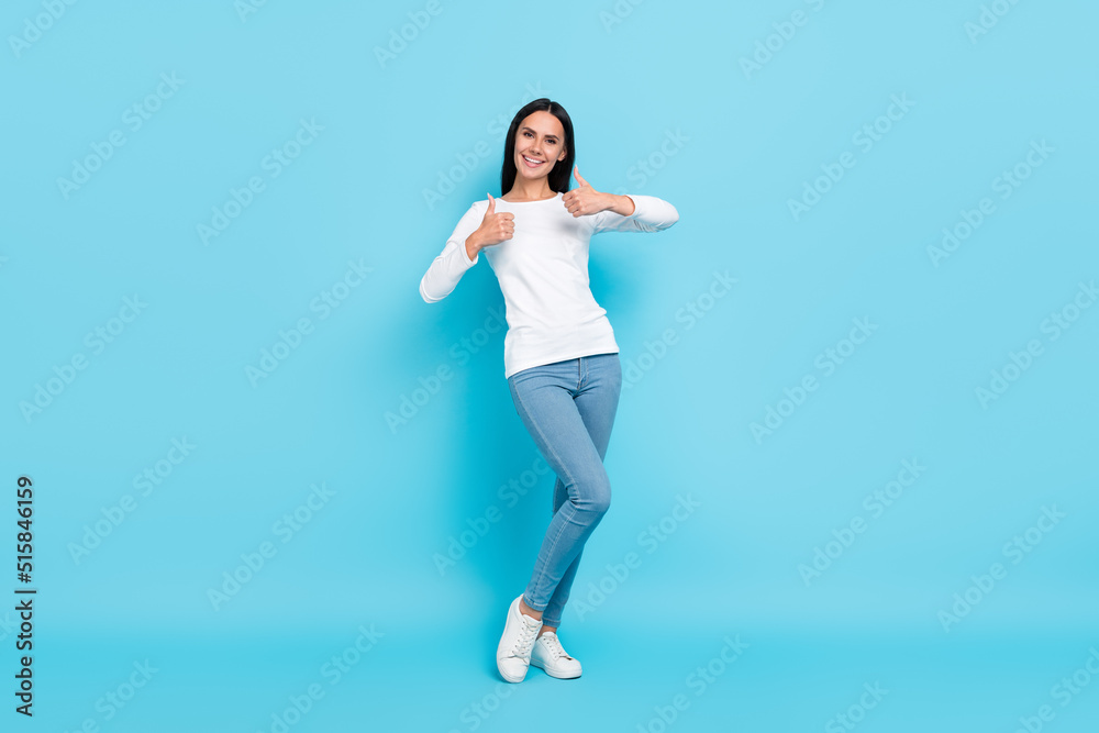 Full body photo of young girl show thumb-up approve select good advertise isolated over blue color background