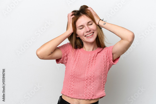 Young English woman isolated on white background laughing