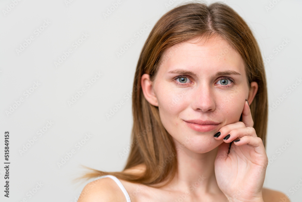 Portrait of pretty young woman over isolated white background Portrait of pretty young woman over isolated white background