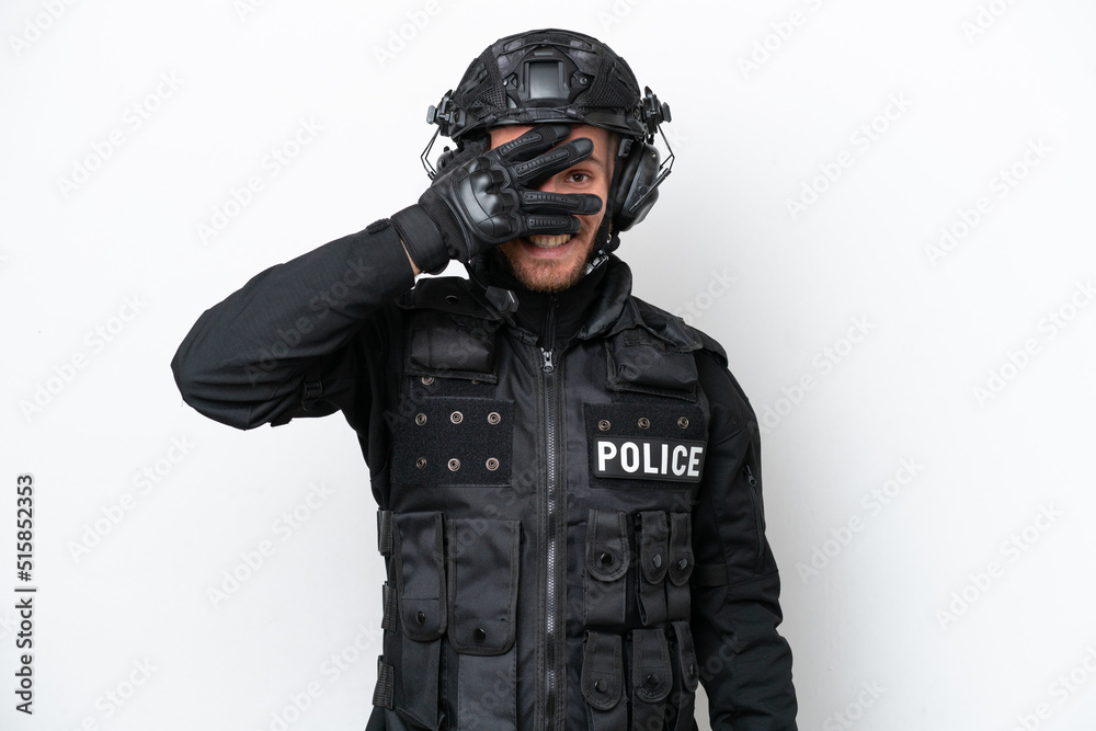 Brazilian soldier man isolated on white background covering eyes by hands and smiling Brazilian soldier man isolated on white background covering eyes by hands and smiling