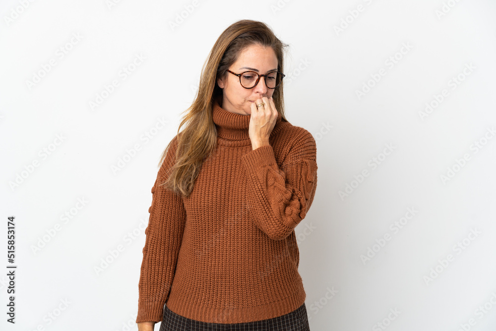 Middle age Brazilian woman isolated on white background having doubts Middle age Brazilian woman isolated on white background having doubts