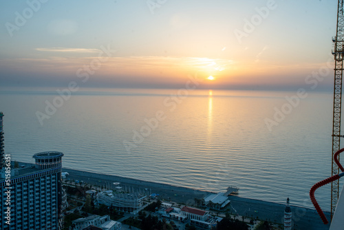 Sunset  from   one skyscraper  of Batumi coastline photo