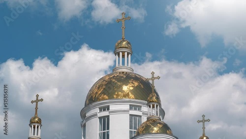 Golden cupolas of church of St. Andrew Pyervozvannoho and All Saints in Bucha town, Kyiv Region, Ukraine photo