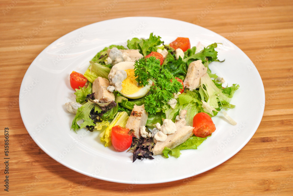 Chicken and Blue Cheese on a Garden Salad Chicken and Blue Cheese on a Garden Salad