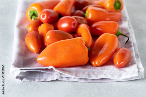 Paprika Pepper Orange Bell Pepper Sweet Orange Peppers on Napkin Horizontal photo