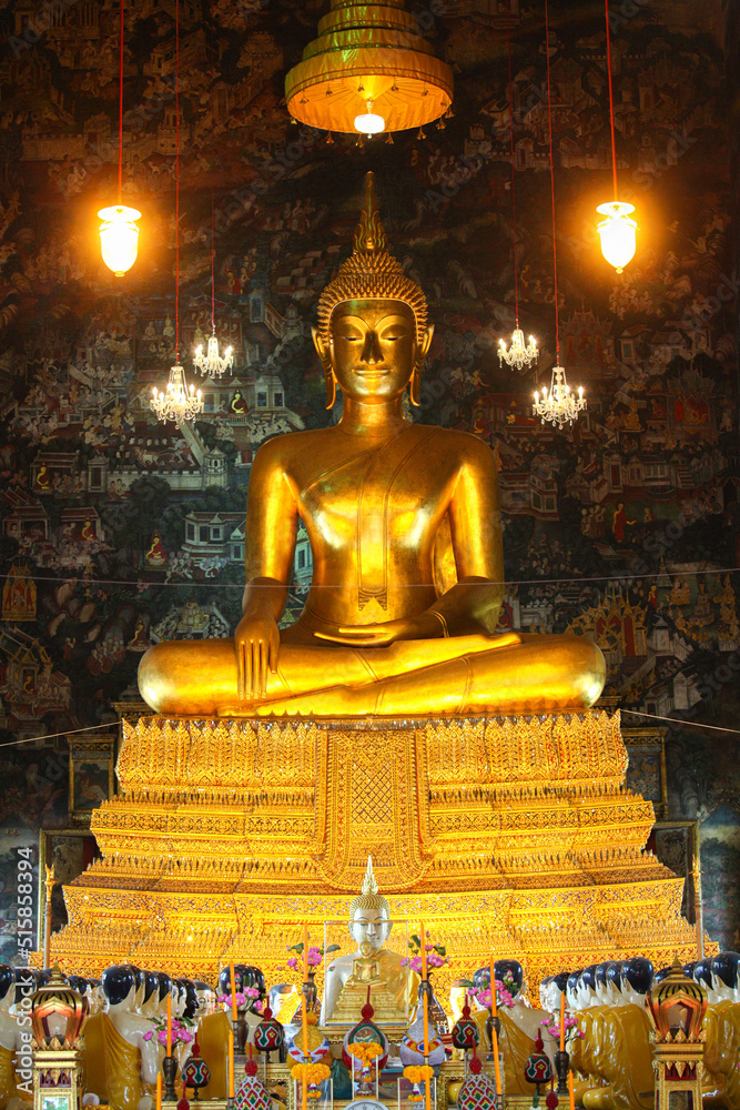 Fototapeta premium Buddha statue, Buddha images and deities close-up, sacred objects, gods, Thai arts, ancient Buddhist art, Buddha made by gold, bronze, silver, photo group and portraits of Buddha