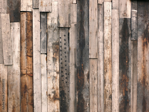 Schilderij op canvas rough textured timber wall made of stained mismatched recycled old planks