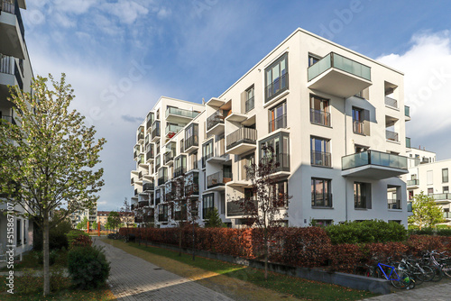 Canvas Print Cityscape of a residential area with modern apartment buildings, new green urban
