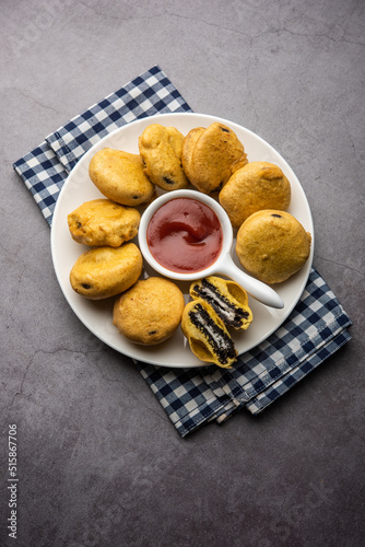 chocolate biscuit pakora, pakodas or fritters, creative Indian teatime snack photo