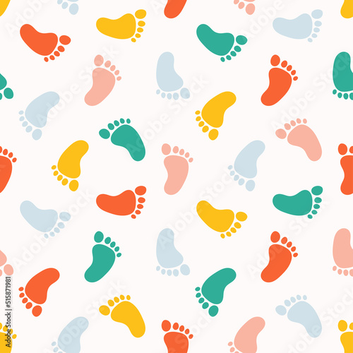 Seamless pattern with colorful baby footprints.