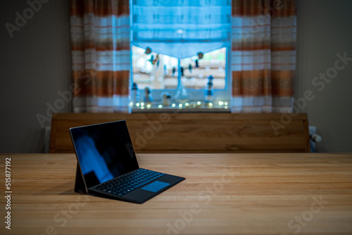 Tablet PC for Homeoffice on a Wooden Desk in Bavaria Germany photo