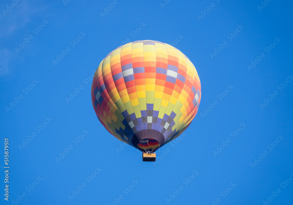Naklejka premium Isolated Colorful Hot Air Balloon Flying Over Ancient Pyramid of Teotihuacan, Mexico