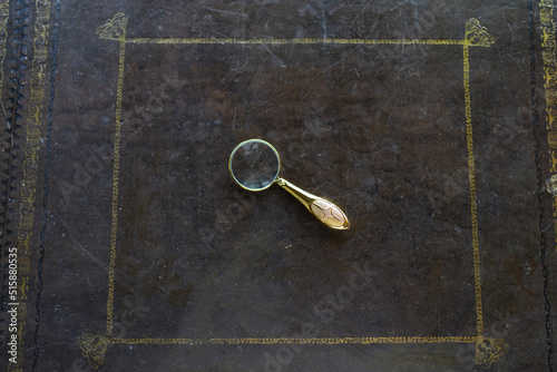 Magnifying Glass in the Table, Bostanci Kadikoy, Istanbul Turkey photo