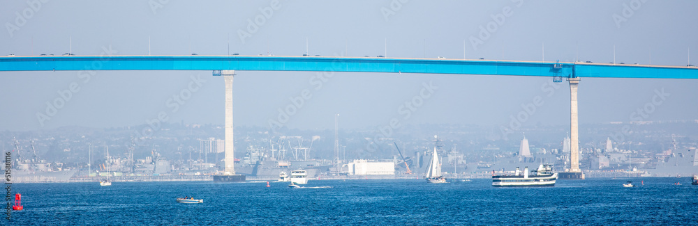 A Panorama of The Coronado Bay Bridge with Shipping Traffic in the Bay San Diego, California,