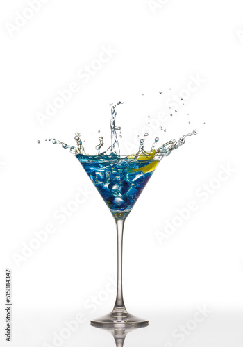 blue cocktail glass splash on white background