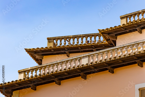 Houses with balconies and blue sky