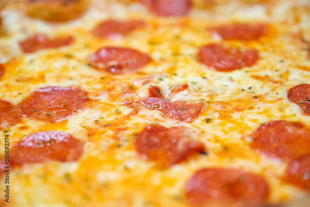 Close up of freshly baked pepperoni pizza. PIzza background. Close up of freshly baked pepperoni pizza. PIzza background.