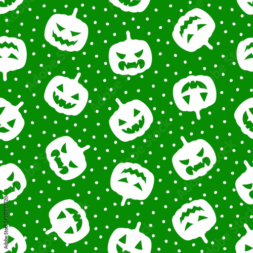 Green seamless pattern with white halloween pumpkin.