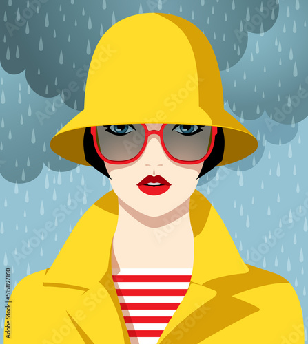 1308_Beautiful woman wearing yellow raincoat and hat outside in the rain