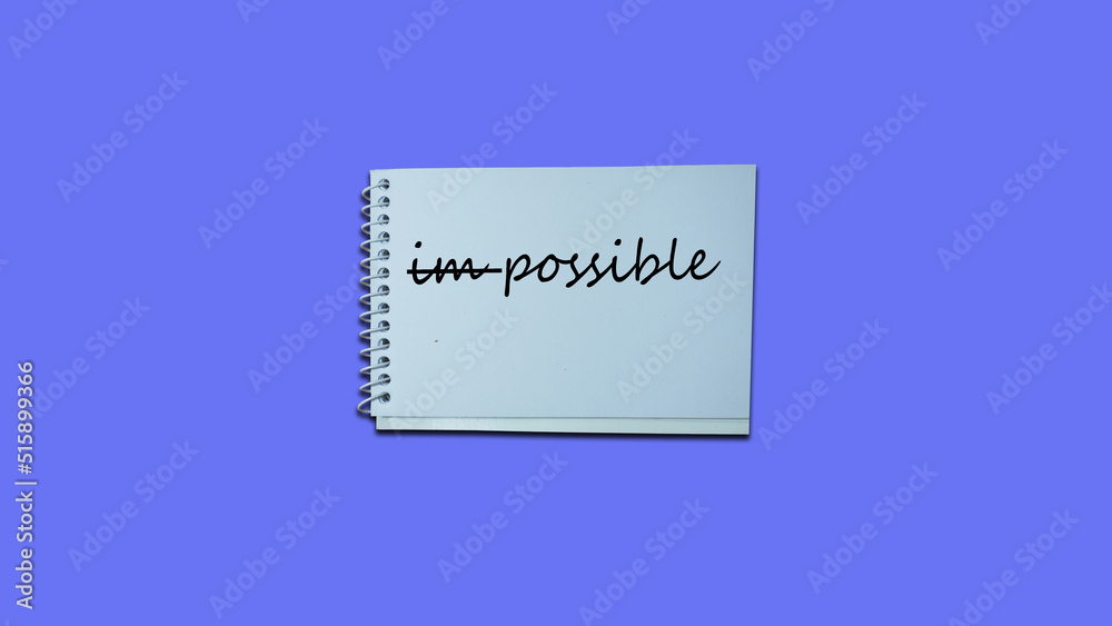 impossible instead possible Hand writing note on a notebook. lifestyle, advice, support motivational positive words are written on a wooden background. Business, signs, symbols, concepts. Copy space. impossible instead possible Hand writing note on a notebook. lifestyle, advice, support motivational positive words are written on a wooden background. Business, signs, symbols, concepts. Copy space.