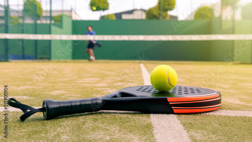 One caucasian mature man playing behind net with padel racket and yellow ball © REC Stock Footage