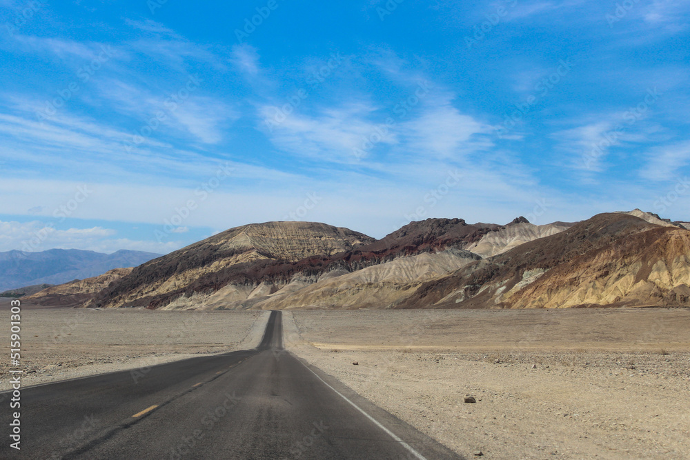 Desert Road Leading into the Beautiful Mountains of Death Valley National Park