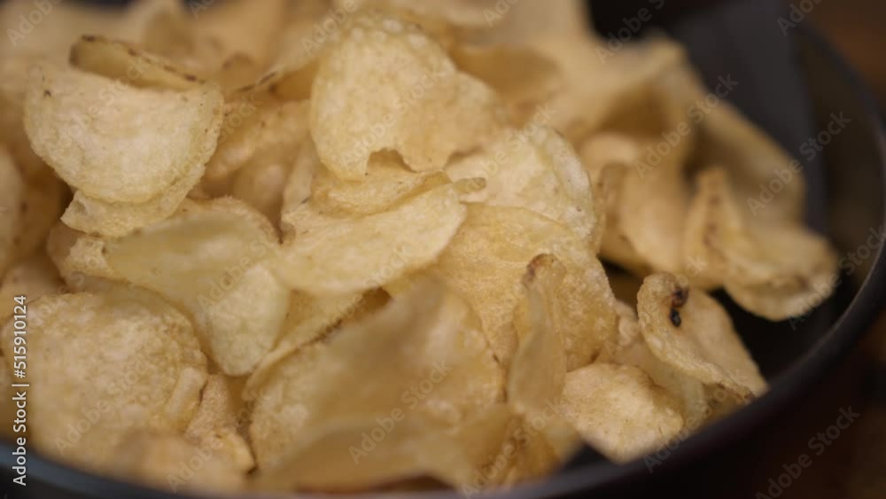 Close up craft fried golden potato chip. Fast food background 4K Close up craft fried golden potato chip. Fast food background 4K