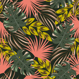 Fashionable seamless tropical pattern with bright plants and leaves on a dark green background. Jungle leaf seamless vector floral pattern background. Tropical botanical.