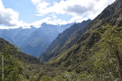 Hiking the green valleys and lush jungle and mountain landscape of the Inca Trail in Peru © ChrisOvergaard