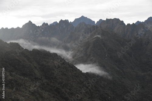Hiking in the beautiful lush green cloud forests and Andes Mountains on the Inca Trail in Peru