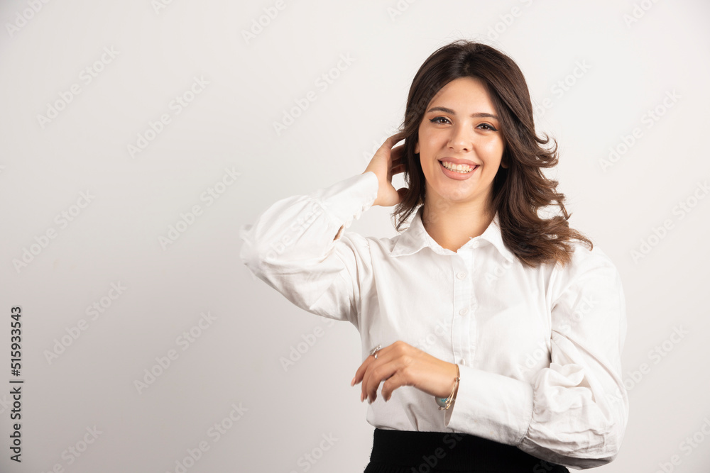 Portrait of positive office worker on white background