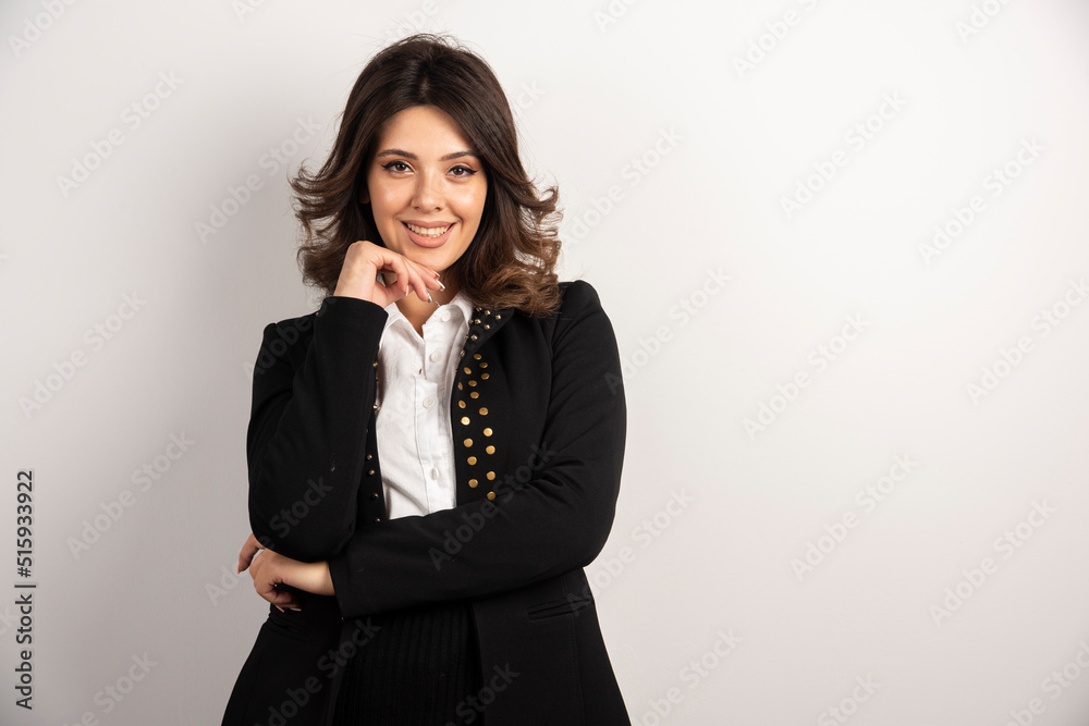 Portrait of positive woman posing on white background Portrait of positive woman posing on white background