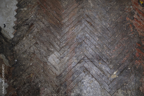 The texture of the old deregulated floor and cement in dark tones photo