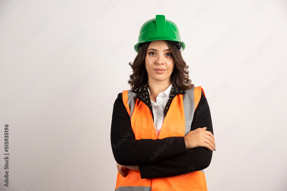 Woman industrial worker posing on white background Woman industrial worker posing on white background
