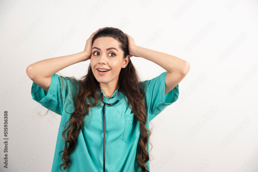 Portrait of female healthcare worker posing on white background Portrait of female healthcare worker posing on white background