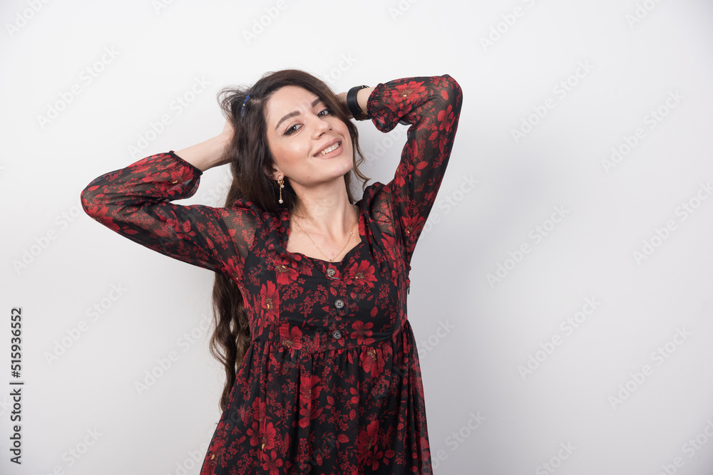 Portrait of beautiful woman looking at camera with happy expression Portrait of beautiful woman looking at camera with happy expression