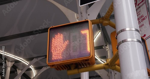 Walk to don't walk in NYC. Traffic light countdown. red numbers. Safely crossing road in Manhattan.