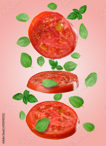 Fototapeta Naklejka Na Ścianę i Meble -  Round red slices of tomato and basil leaves levitate on a pink background.