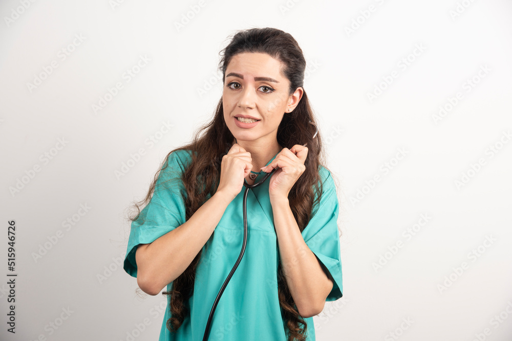 Portrait of female healthcare worker posing on white background Portrait of female healthcare worker posing on white background
