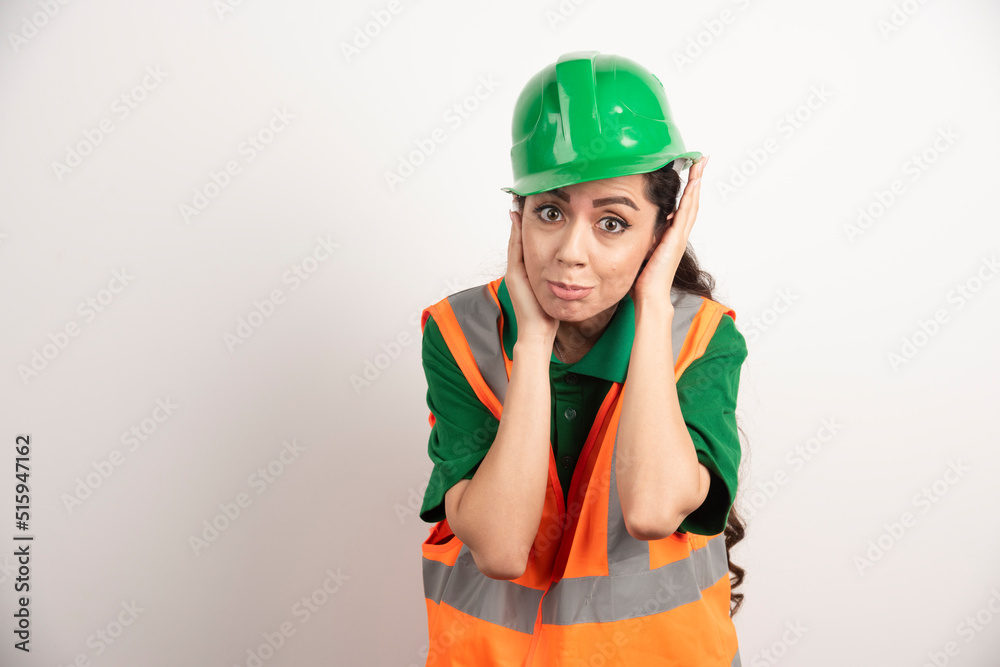 Successful woman in hardhat wearing uniform Successful woman in hardhat wearing uniform