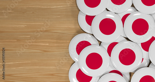 3D rendering of Japan flag pins on a wooden table for politics, support and nationalism