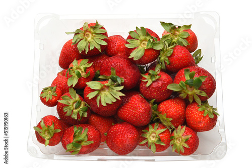 Overhead shot of a plastic clamshell full of fresh ripe strawberries