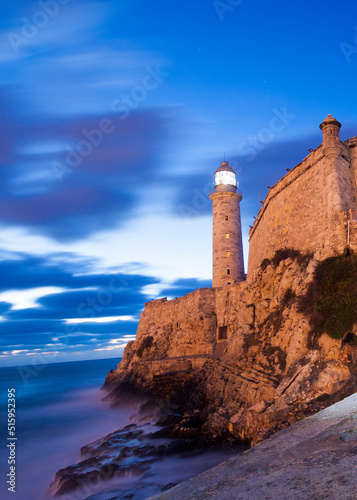 Lighthouse on the coast of the sea © Douglas