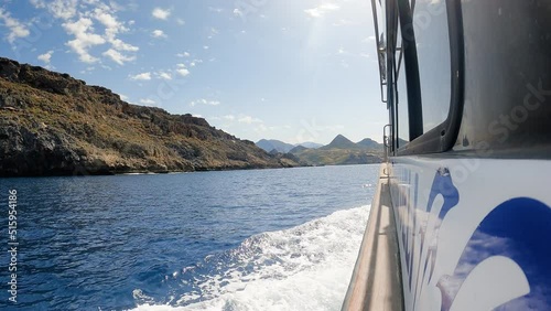 Moving along the southern coast of Crete in a boat in UHD resolution photo