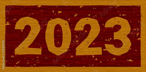 木材に焼印された「2023」の文字素材