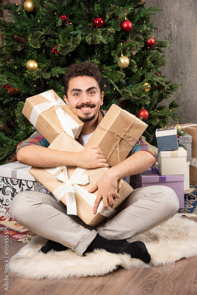 Fototapeta premium Christmas morning opening all gifts