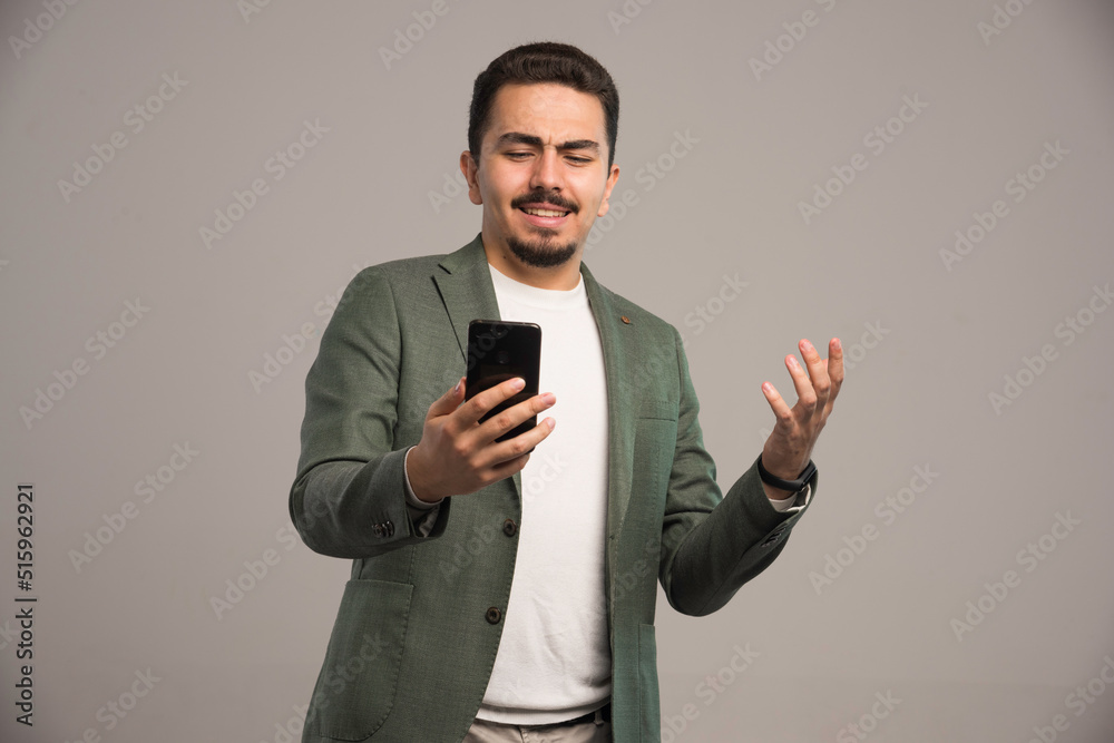 A businessman in dress code having a video call A businessman in dress code having a video call